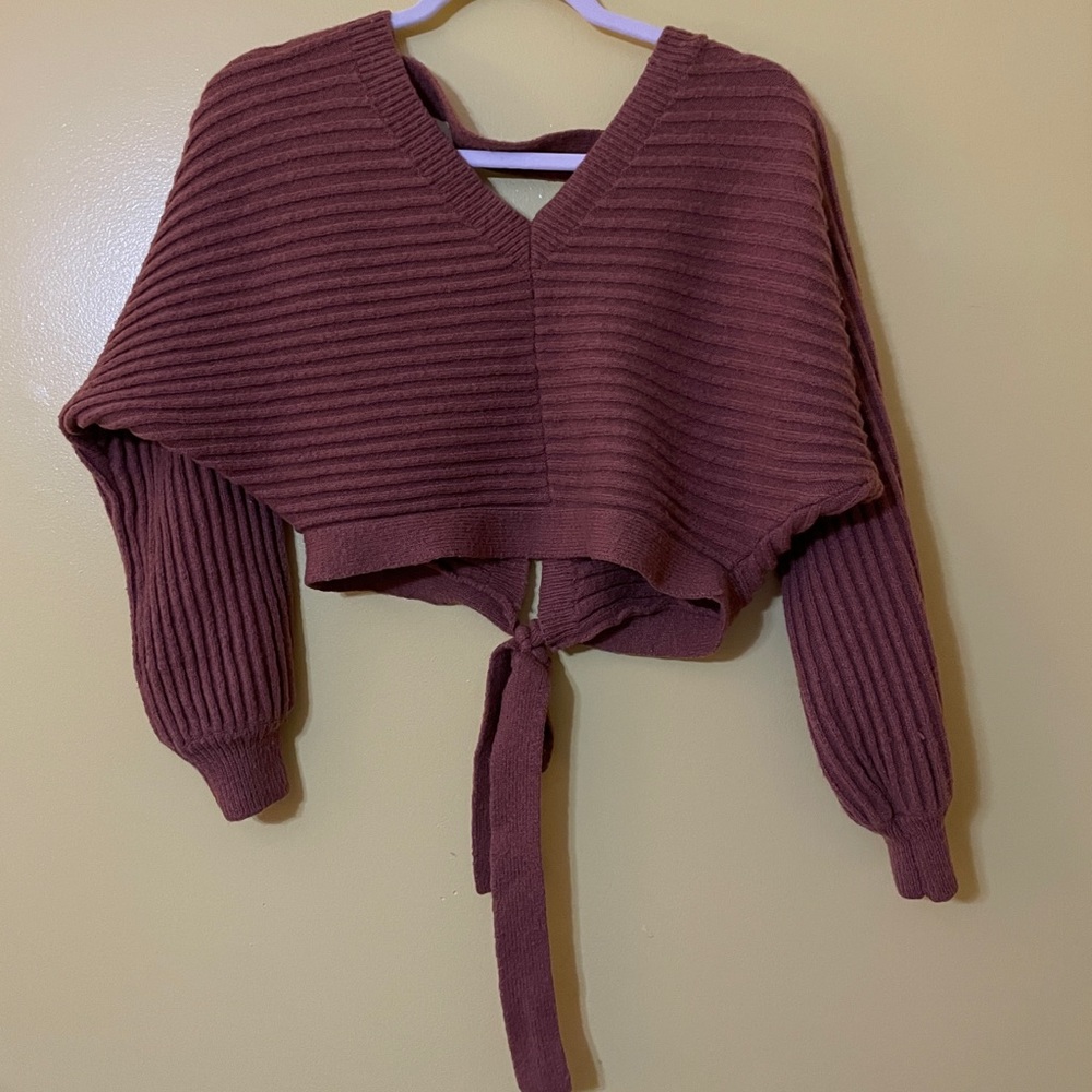 worn 4 times . Very cute top!